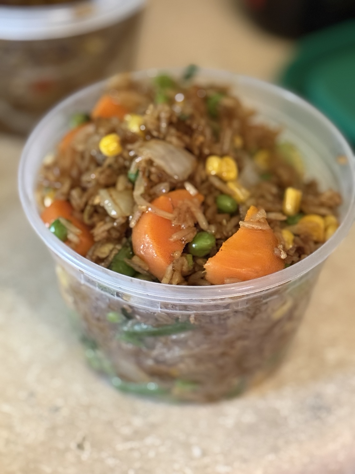 Container of St. Louis Style Fried Rice with vegetables